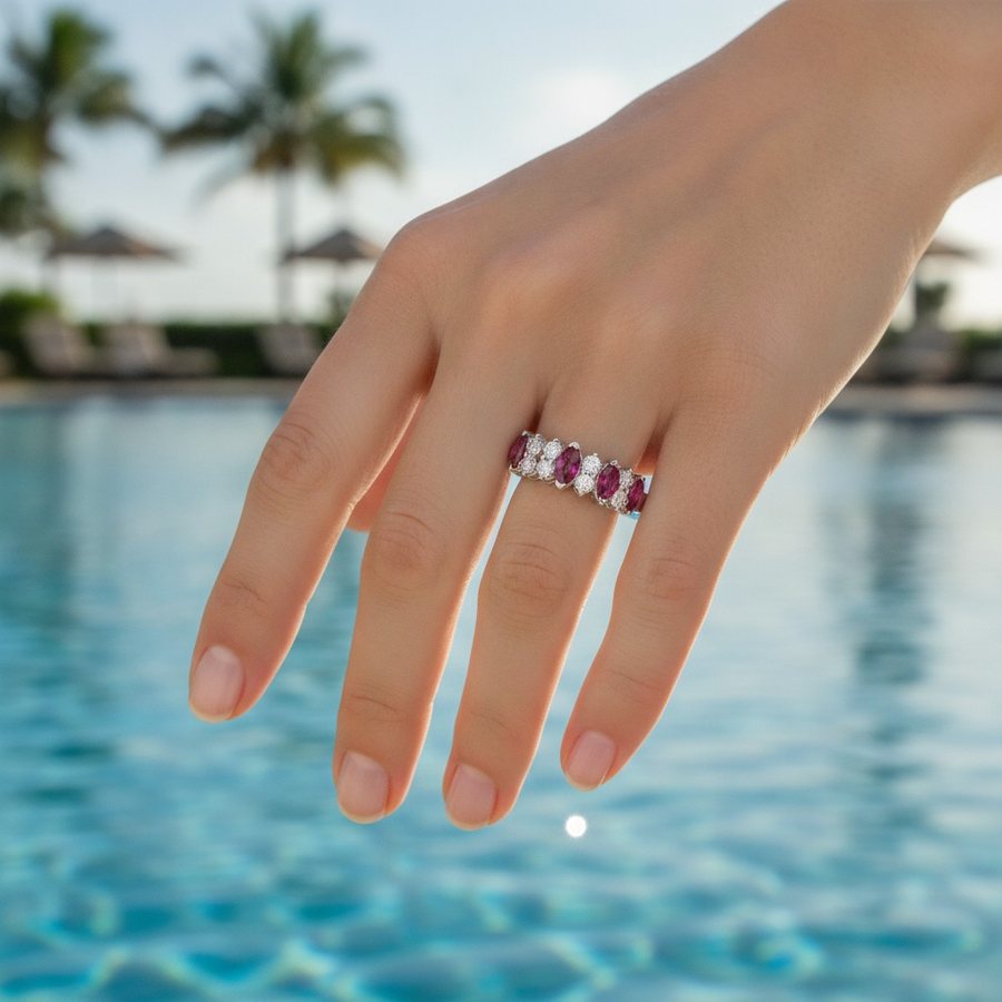 AI-styled scene: the ruby ring worn on a hand by a resort pool